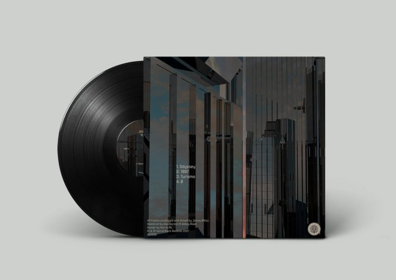 Image shows a back cover of a vinyl, featuring two glossy blue buildings made from digital 3D, with a small gap between them that runs down the middle. In the gap is the sky, it’s a bright pinky blue. 