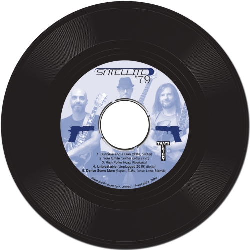 Satellite '79 - Suitcase and a gun