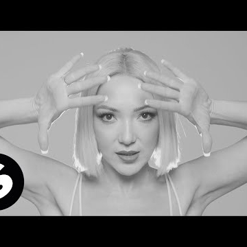 Preview image for the video "Tita Lau - What Is Real (Music Video)".